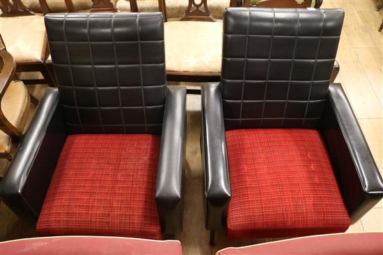 A pair of black and red 1960s armchairs
